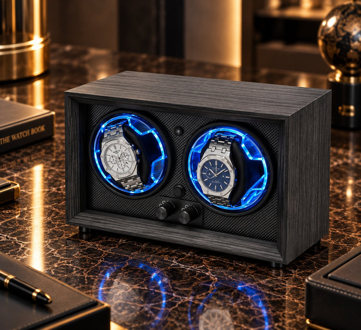 Caisson gris fumé vu de profil, deux montres dans leurs anneaux bleus