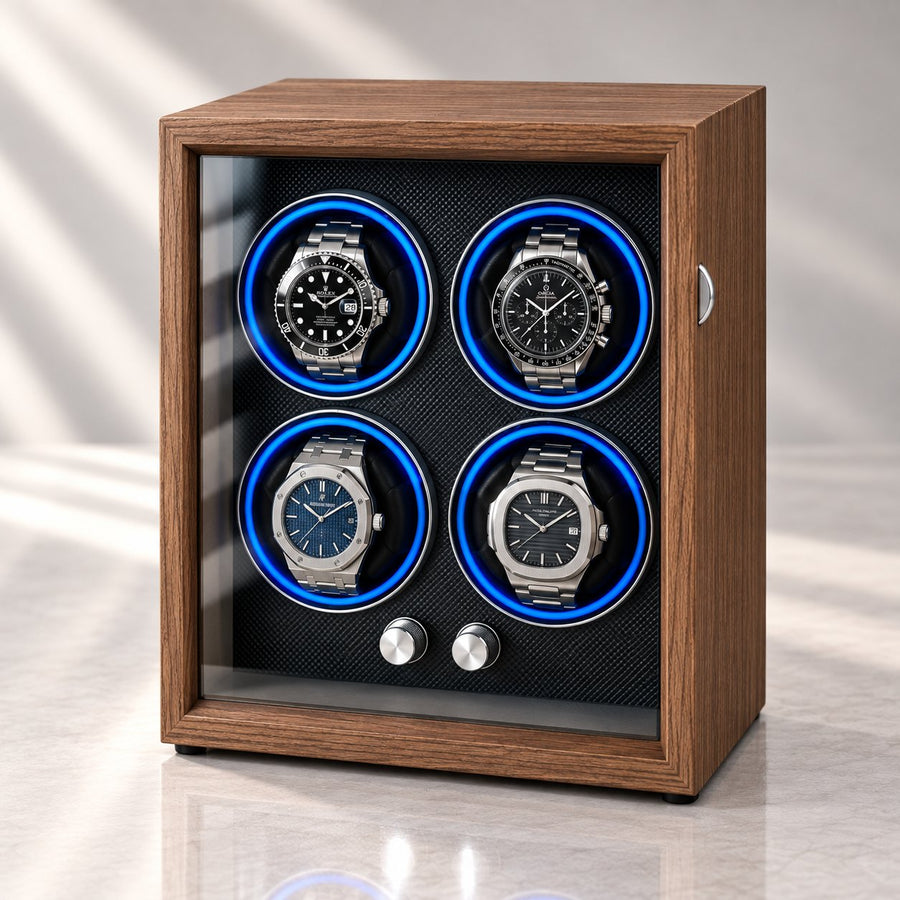 Coffret 4 montres en bois, porte vitrée fermée, commandes chromées en façade, berceaux éclairés en bleu.