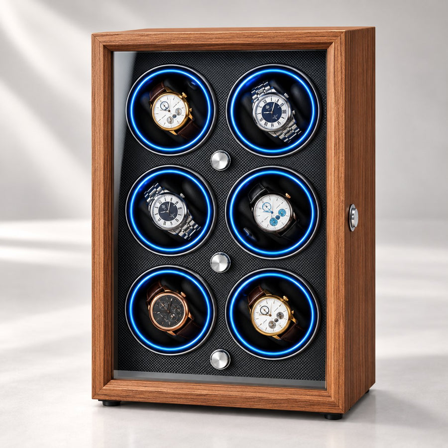 Coffret 6 montres en bois, trois rangées de deux berceaux éclairés, porte vitrée fermée.